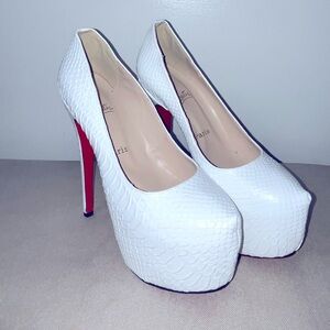 Red bottom Christian Louboutin heels
